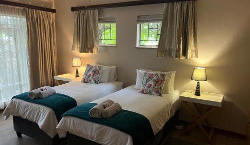 Deluxe Two-Bedroom Apartment with Garden View