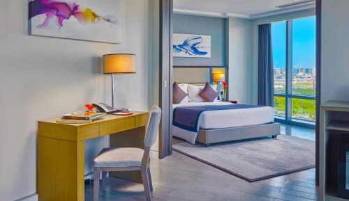1 Bedroom Suite with Living room and Airport view