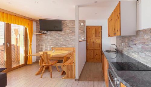 Two-Bedroom Apartment with Balcony and Garden View