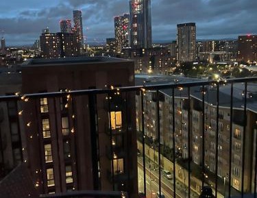 One-Bedroom Apartment with Balcony and City View