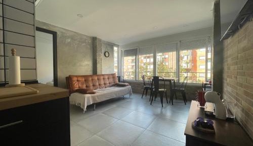 One-Bedroom Apartment with Balcony and City View