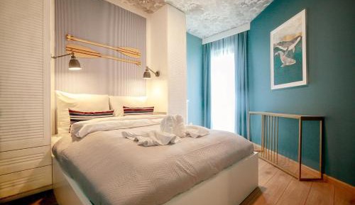 Two-Bedroom Apartment with Balcony and Sea View