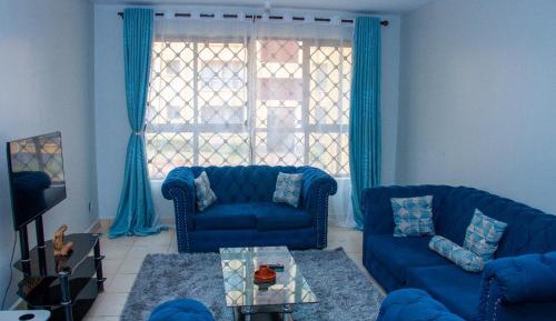Four-Bedroom Apartment with Balcony 