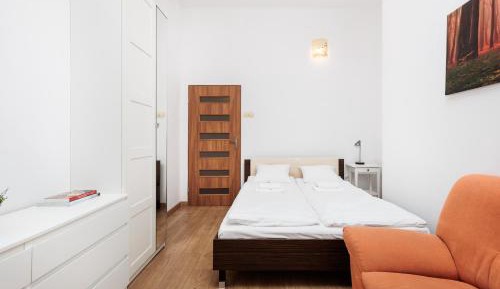 Four-Bedroom Apartment with Balcony 
