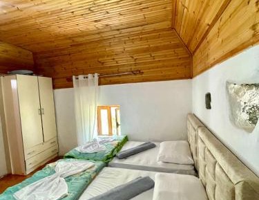 Quadruple Room with Shared Bathroom