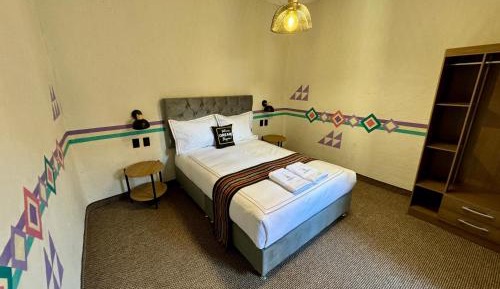 Queen Room with Shared Bathroom