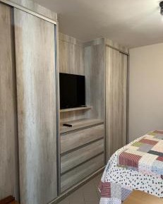 One-Bedroom Apartment with Balcony and City View