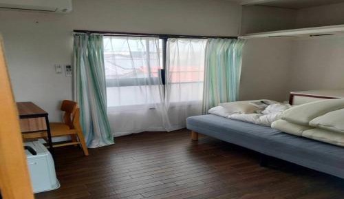 Standard Double Room with Shared Bathroom