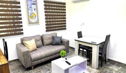 One-Bedroom Apartment with Balcony and City View