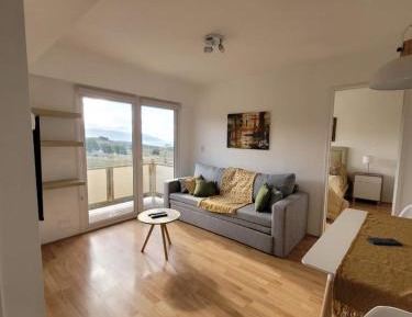 One-Bedroom Apartment with Balcony and Mountain View  