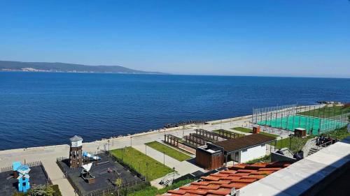One-Bedroom Apartment with Balcony and Sea View