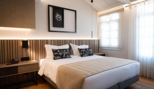 Deluxe Double Room with Balcony and City View