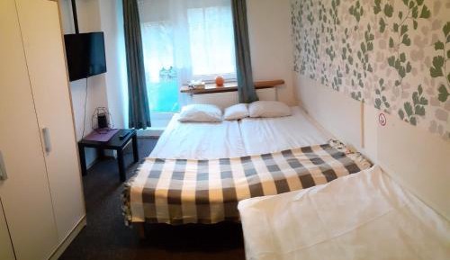 Basic Triple Room with Shared Bathroom