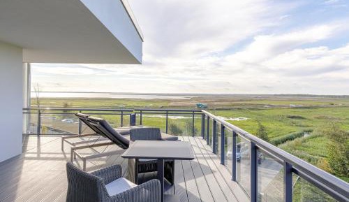 Ferienwohnung Strandlounge mit Balkon & Meer- und Boddenblick 