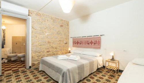 Quadruple Room with Private Bathroom