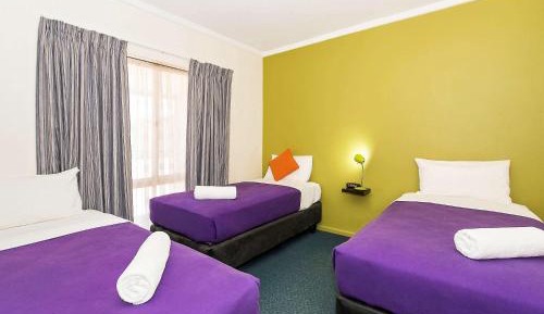 Standard Room with One Queen Bed and Two Single Beds
