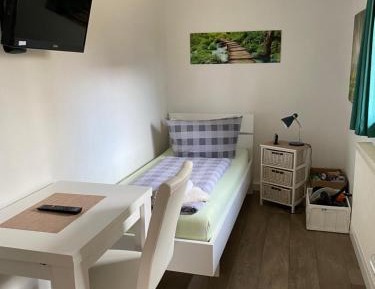 Single Room with Shared Shower and Toilet