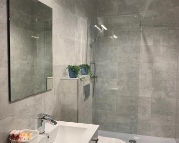 Quadruple Room with Private Bathroom