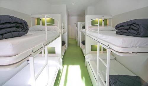 Bed in 12-Bed Dormitory Room with Bathroom 