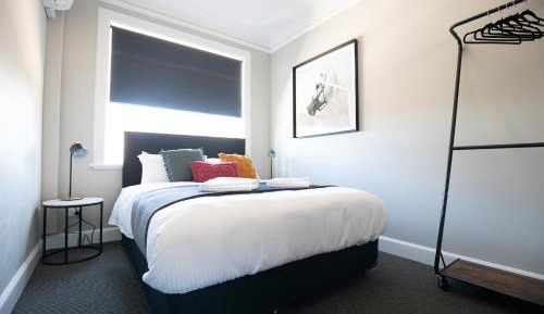 Queen Room with Shared Bathroom