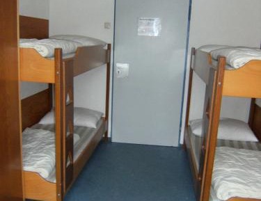 Single Bed in Female Dormitory Room