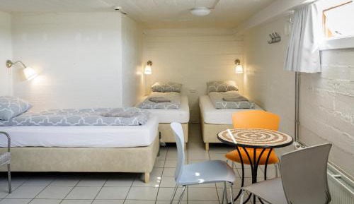 Single Bed in Dormitory Room