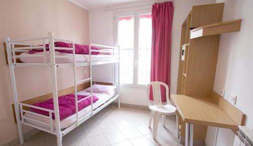 Single Bed in Dormitory Room