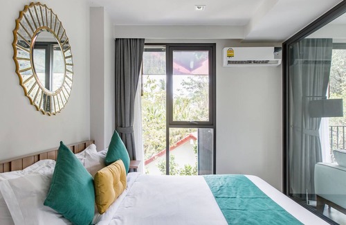 Patong Apartment | Walk to Patong Beach from a Sleek, Daylit Apartment