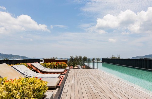 Patong Apartment | Walk to Patong Beach from a Sleek, Daylit Apartment