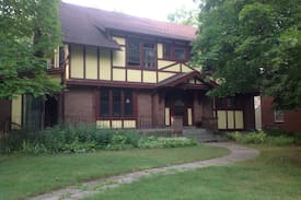 Des Moines House | Red room in Casual Tudor Revival.