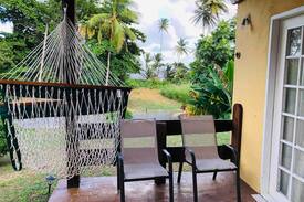 Bacolet Apartment | Bago Beach Cottage: Oceanfront Relaxation
