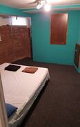 Congress Park House | Room with exposed brick for rent
