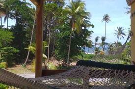 Bacolet Apartment | Bago Beach Cottage: Oceanfront Relaxation