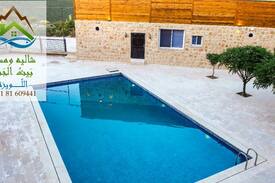 Iqlim al Tuffah Villa | شاليه ومسبح بيت الجبل