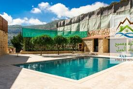 Iqlim al Tuffah Villa | شاليه ومسبح بيت الجبل