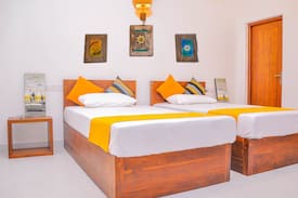 New Town Resort | Amuththa Resort- Room Blossom