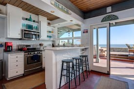 Faria Beach House | Stylish Oceanfront Dolphin House on a Sandy Beach