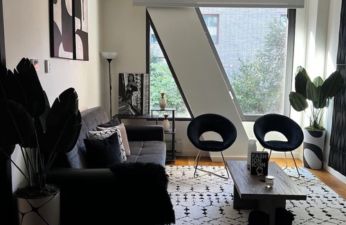 East Williamsburg Condo | Electrifying 1-bedroom condo with Bowling, Pool, Theater and Rock Climbing!