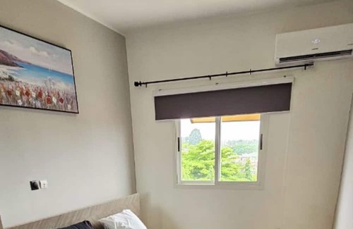 Deux Plateaux Apartment | Residence furniture over cloud open door to 2 plateau vallon
