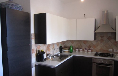 Siniscola House | Holiday Home 'Capo Comino A Due Passi Dal Mare' with Sea View, Private Terrace and Private Garden