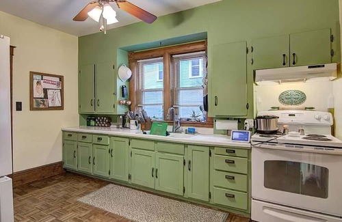 Eau Claire House | Victorian Beauty with Four Beds, Wi-Fi, Smart TVs, and a Great Yard.