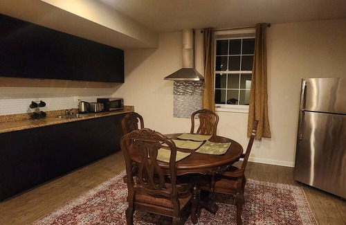 Triangle House | Walk in sunny furnished basement with 2 bedrooms and 2 bathrooms