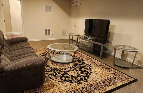 Triangle House | Walk in sunny furnished basement with 2 bedrooms and 2 bathrooms