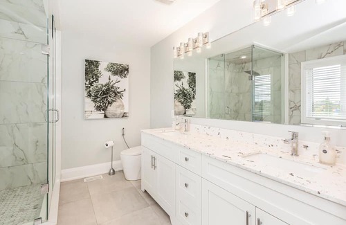 Brampton House | Luxury Six Bedroom home with main floor ensuite and spacious backyard.