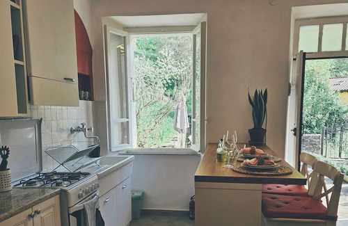 Bagnone House | Traditional Italian stone house with large terrace and lovely view