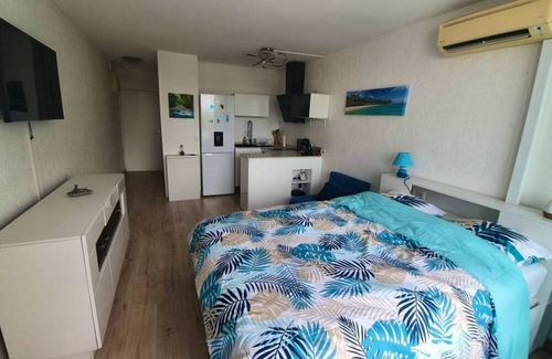 Pointe de la verdure Apartment | Homerez - 100 m away from the beach! Studio for 3 ppl. with shared pool