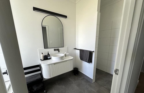 Falcon House | Stunning Falcon beachside house. 100m from dipping your toes. Pack your bag!