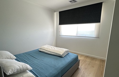 Falcon House | Stunning Falcon beachside house. 100m from dipping your toes. Pack your bag!