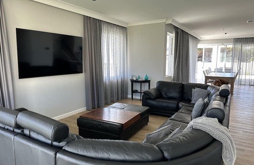 Falcon House | Stunning Falcon beachside house. 100m from dipping your toes. Pack your bag!