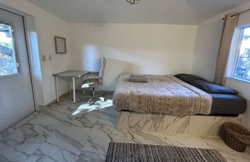 West Little River Apartment | Cozy Cabin with private fenced garden in Miami. Kick back and relax here.